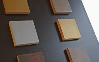 Real-metal coatings by spraying