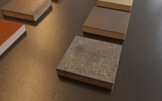 Real-metal coatings by spraying