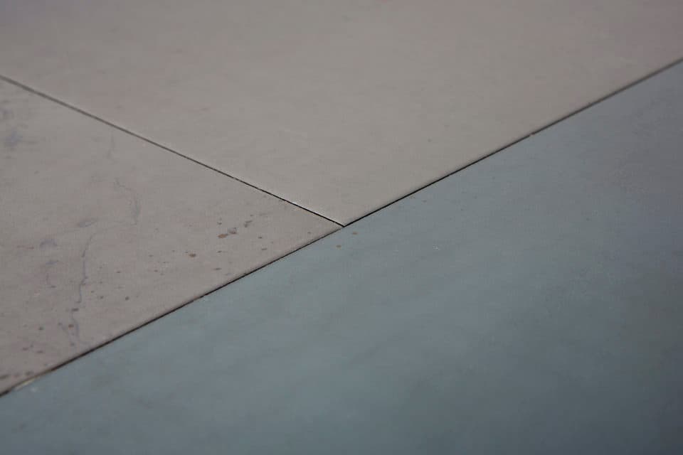 Steel floor tiles