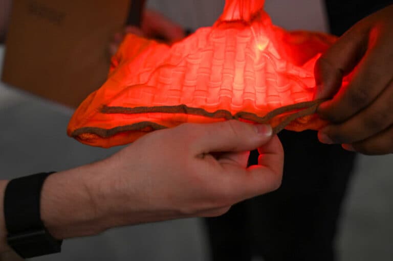 Multistable Knitted Textiles Snap Between Different Shapes