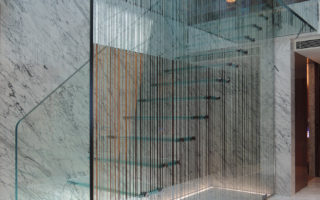 The Materials Behind This Ethereal Floating Glass Stair + Skylight