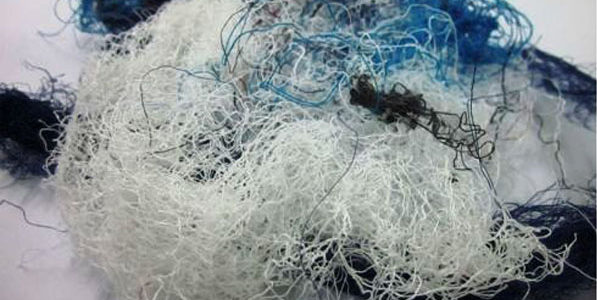 Lightweight wall panels made from waste textile fibres