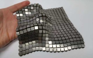 3D printed metallic fabric for use in space