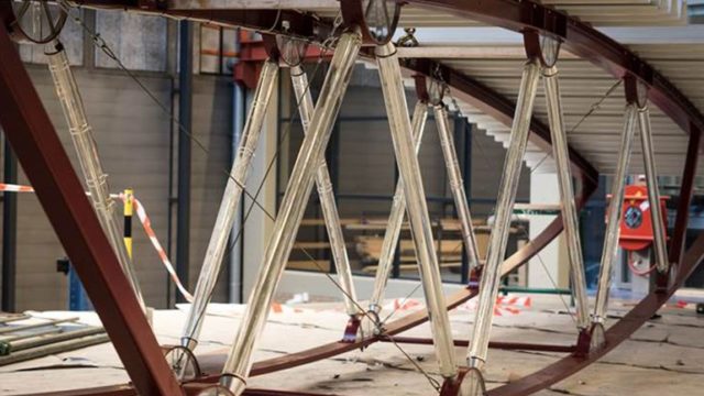 World’s first bridge with glass columns strong enough to hold student ...