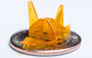 Self-folding origami from photocurable polymers leaves your hands free