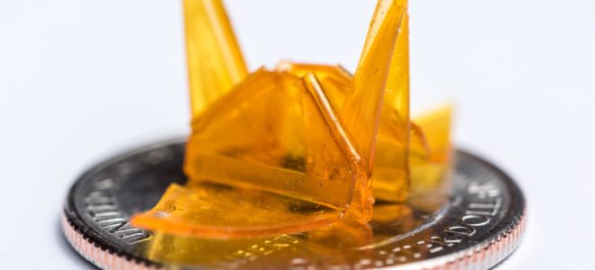 Self-folding origami from photocurable polymers leaves your hands free