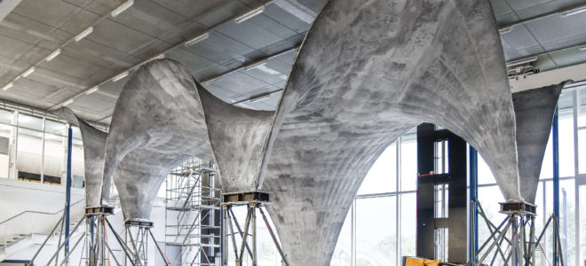 An ultra-thin, sinuous concrete roof made with new design and fabrication methods