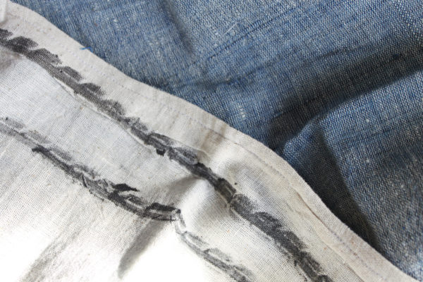 Hand-woven scarves printed with pollution - MaterialDistrict