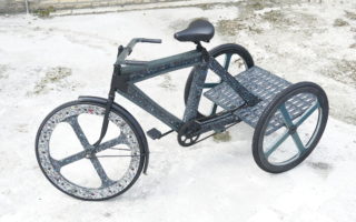 A modular tricycle made from recycled plastic waste
