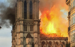 Notre Dame’s lead-clad wooden roof destroyed in fire