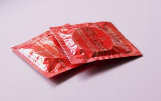 A self-lubricating condom