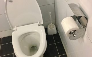 Saving flush water with a new toilet coating
