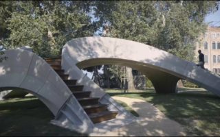 The first 3D printed and unreinforced concrete bridge