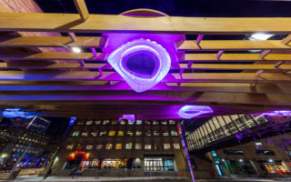 A mass timber canopy with 3D printed colourful lights