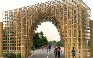 A vaulted gate made of bamboo lattice