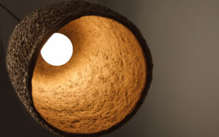 Pendant lamps made of recycled cardboard and clay