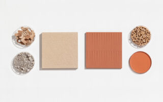 Interior panels made with paper waste