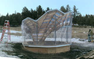 Floralis: A Sustainable Timber and ETFE Pavilion Protecting Prehistoric Heritage