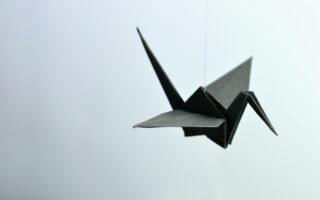 Kiri-Origami Unlocks High-Performance Stretchable Electronics