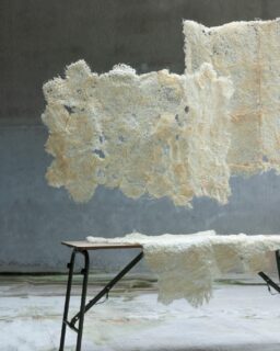 From 22 December to 2 January, we are sharing the Top 10 most viewed materials on MaterialDistrict — a selection of material innovations that captured the attention of our global design community.

#7 Root Textile – grown, not manufactured

At number 7: Root Textile, a biobased material developed by @Rootfull that brings design and biology together in a remarkably direct way.

Using only wheatgrass seed and water, roots are grown through templates carved from beeswax, allowing the material to be woven entirely by nature. As the roots grow, they form unique pathways, creating naturally textured structures that are used for acoustic wall hangings and lamps.

Each piece develops differently, responding to natural growth patterns and resulting in objects defined by variation, light and shadow. The process is fully organic and low-impact, with locally sourced ingredients and minimal waste.

A powerful example of bio-design and regenerative thinking, showing how living systems can shape materials for our built environment.

👉 Discover Root Textile on MaterialDistrict.com

#material #materials #materialinnovation #biodesign #biobased #acousticdesign #textiles #regenerativedesign #naturalmaterials #materialdistrict