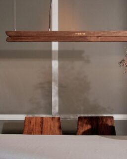 Moono is a sliding pendant light developed by Tbilisi-based @shrestudio. The project centres on the use of solid oak or walnut not only as a visible finish, but as the primary structural and mechanical component of the luminaire. Rather than concealing technology within synthetic housings, the design integrates movement, structure and light within a single timber body.

The lamp consists of a fixed wooden base and a movable wooden panel that houses the integrated LED light source. By sliding the panel along a concealed track embedded within the solid wood, users can adjust the light’s direction and intensity. The physical movement alters the spatial presence of the luminaire, shifting from a flat, linear element to a more projecting architectural feature.

Read more at https://materialdistrict.com/article/moono-sliding-pendant-light-explores-kinetic-lighting-in-solid-timber/

#MaterialInspiration #Materials #SolidTimber #SlidingPendant #LightingDesign #MaterialInnovation #InteriorDesign #ProductDesign #SustainableLighting