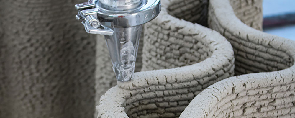 CORNCRETL: Corn Waste And Lime Composite For Robotic 3D Printed Construction