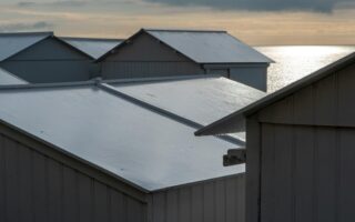 Cool Roofs As A Material Strategy To Reduce Urban Heat
